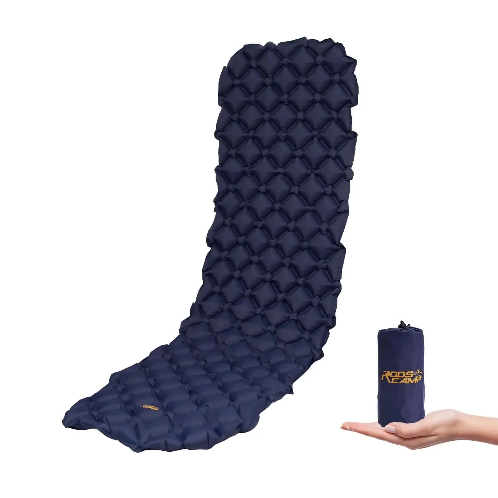 Dark blue RoosCamp RoosPad Ultra inflatable sleeping pad fully expanded beside its matching stuff sack